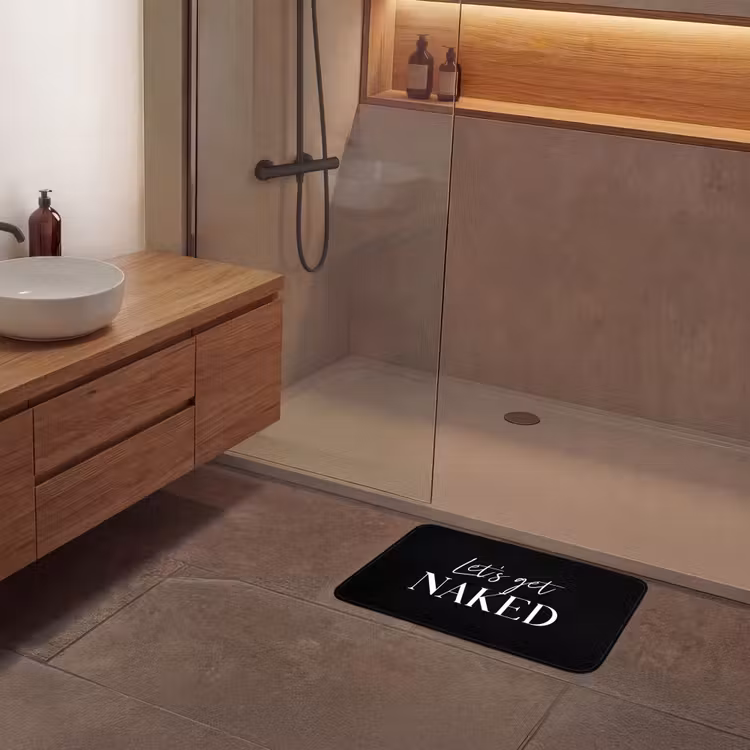 Quotes - Let's get naked - Zwart - Spreuk Badmat klein -sfeer2