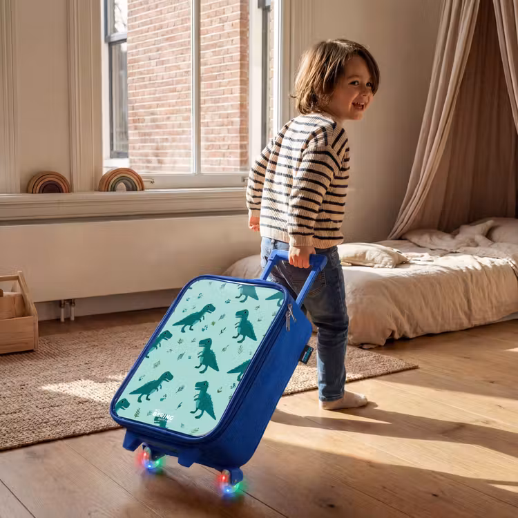 Vriendelijke T. rex tussen sporen Kinderkoffer - Blauw klein -sfeer1