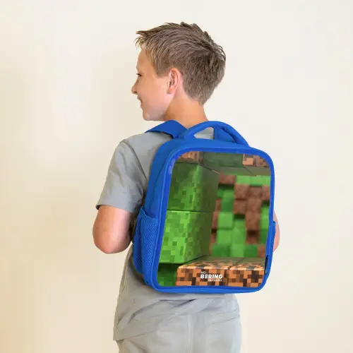 Close-up met pixelachtige blokken Kinderrugzak - Blauw middel -sfeer2